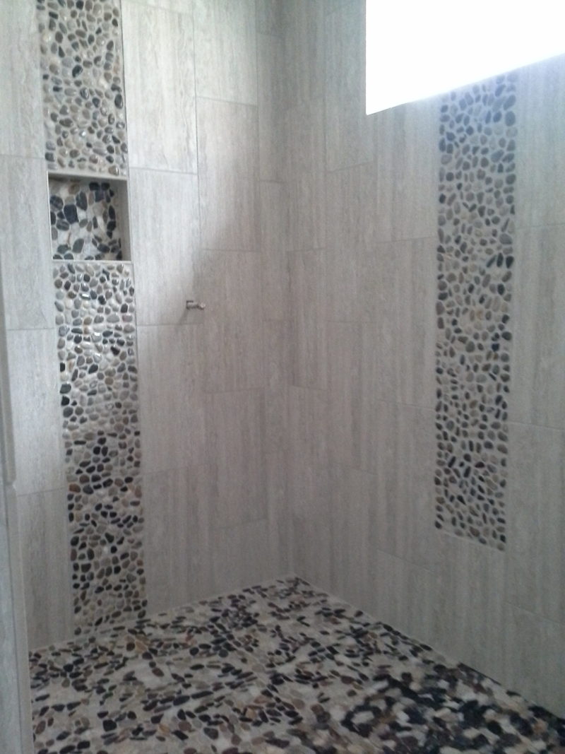 Tiled shower with natural lighting
